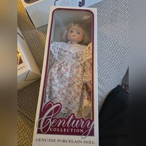 Vintage Century Collectible Porcelain Doll with Floral Dress